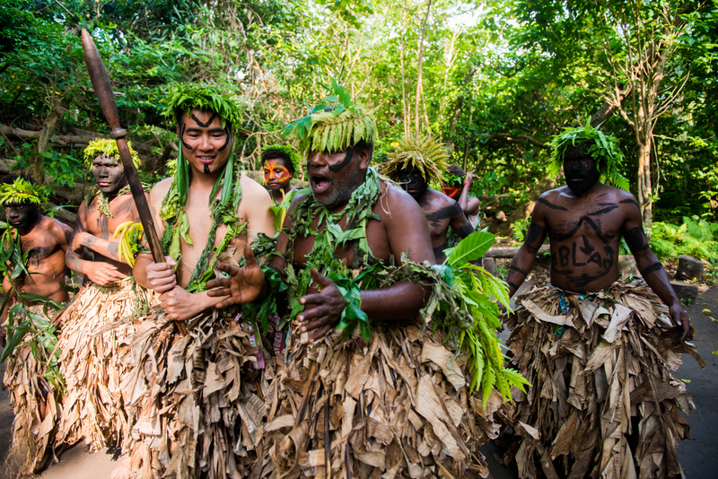 Tourist and villagers dressed in traditional attire performs cultural dance, Tanna Island, Tafea Province, Vanuatu. Photo: Vanuatu Tourism Office/JP Niptik