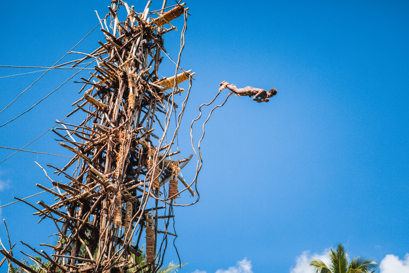 a ni-Vanautu man jumps of the tower as part of the Nagol at Pentecost Island, Penama Province