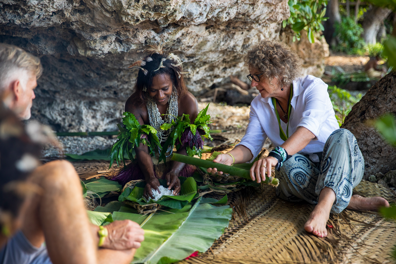 Visitors watch the preparation of a ceremonial feast, Small Nambas Tour, Rano, Malekula Island, Vanuatu.