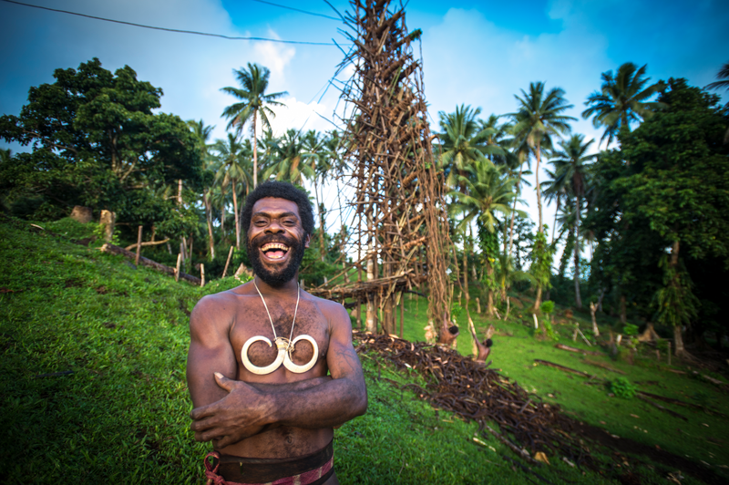 A local chief standing beside the nagol tower, Pentecost island. Credit: Vanuatu Tourism Office/David Kirkland