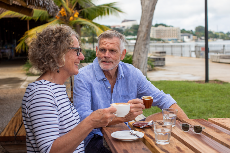 Visitors drink coffee at Nambawan Café, Port Vila, Efate Island, Vanuatu.